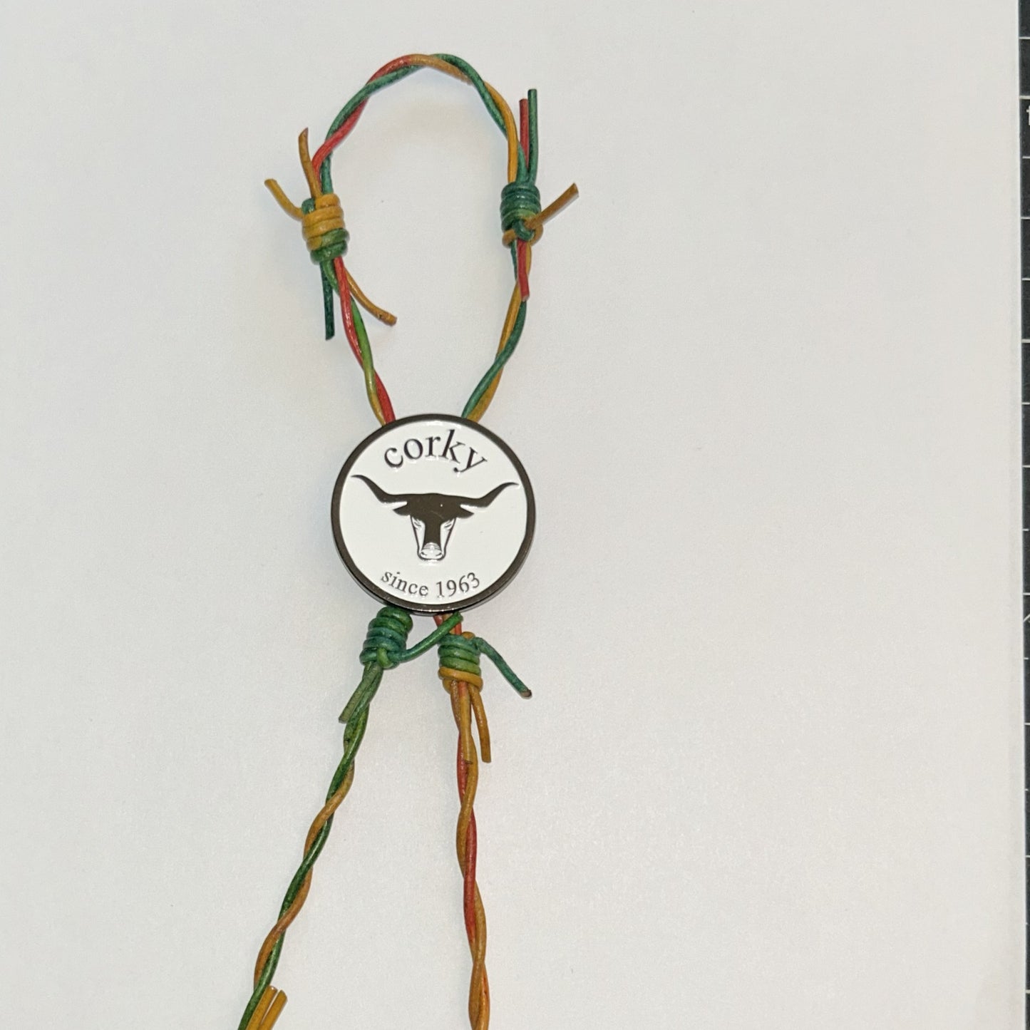 36 - 38β Reggae Leather Barbed Wire Bolo Tie β Red, Gold, Green with Silver Tips
