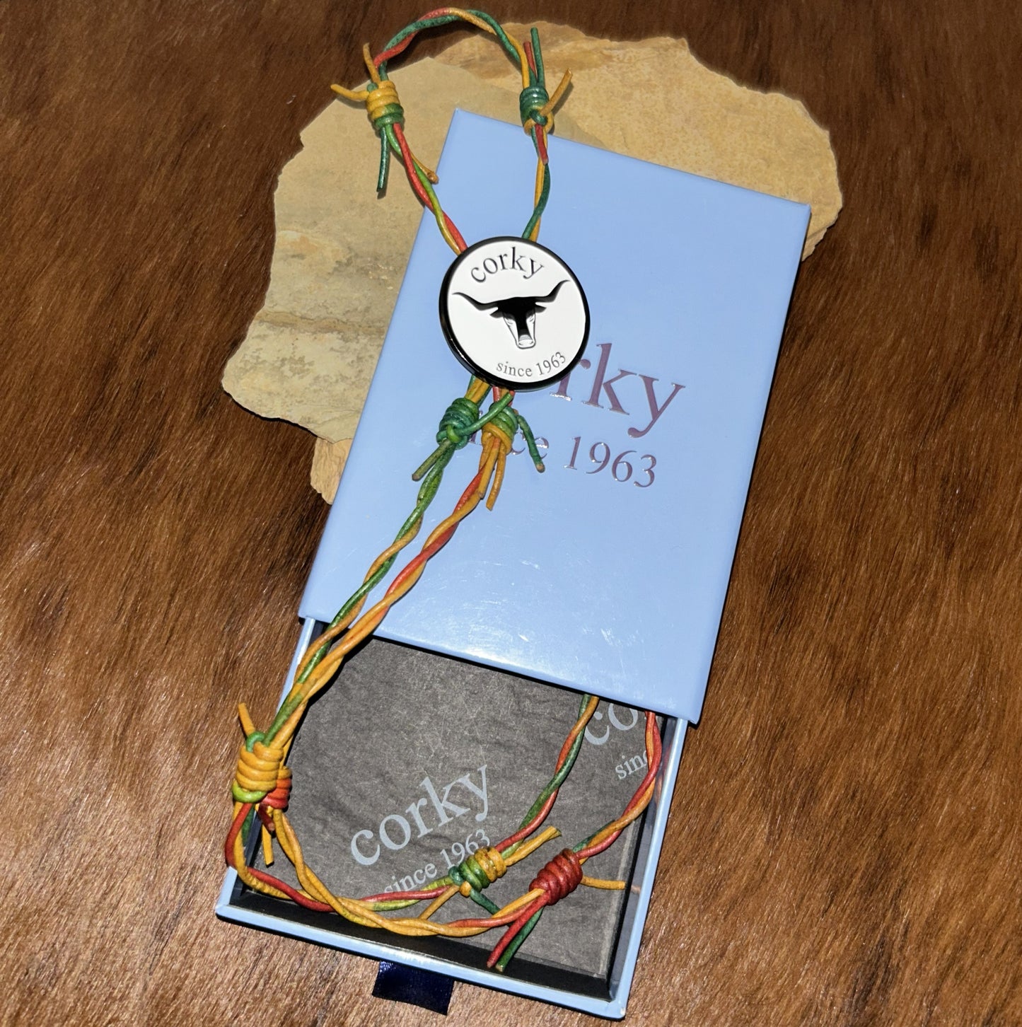 36 - 38β Reggae Leather Barbed Wire Bolo Tie β Red, Gold, Green with Silver Tips
